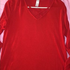 red long sleeve top